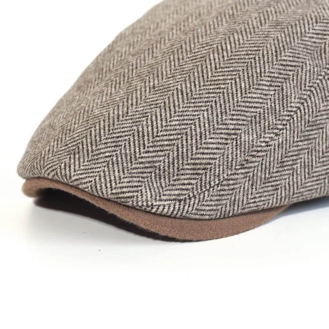 Wollen ivy cap met visgraat — HELLEVOETSLUIS
