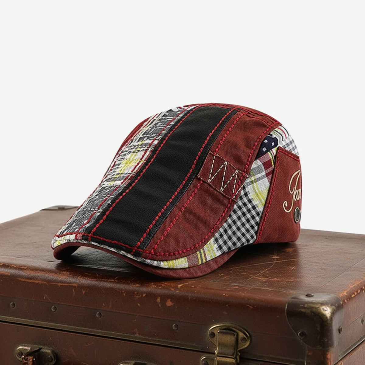 Katoenen flatcap met patchwork — REUSEL