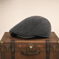 Wollen chauffeurspet met oorkleppen — ASSEN